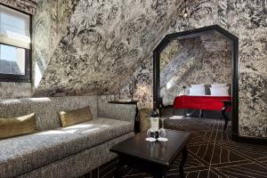 Hotels Le Pavillon de la Reine & Spa : photos des chambres