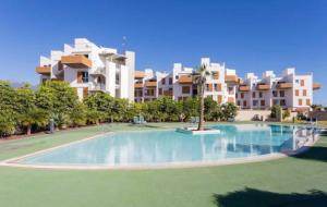 Sea View Apartment in El Médano with pool & private parking space