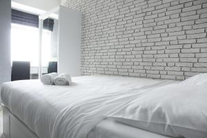 Modern and Comfortable Studio Apartment Springlake Summarecon near Summarecon By Travelio