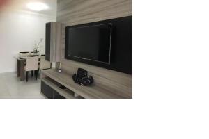 Apto pé-na-areia em Bertioga - Indaia Home Club