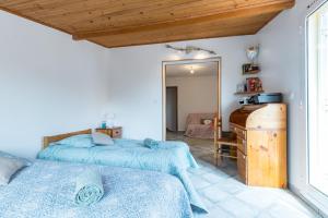 Maisons de vacances La maison des vacances : photos des chambres