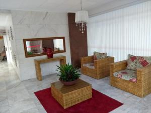 Apartamento Dulce Pitangueiras Guarujá com varanda