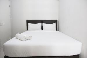 2BR with Sofa Bed The Springlake Summarecon Bekasi Apartment By Travelio