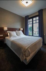 Hotels Ambassadeurs Logis Hotel : photos des chambres
