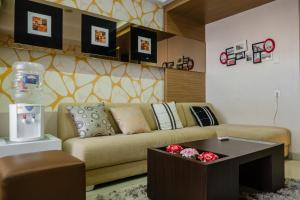 Luxurious 1BR At Dago Suites Apartment By Travelio