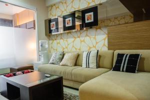 Luxurious 1BR At Dago Suites Apartment By Travelio
