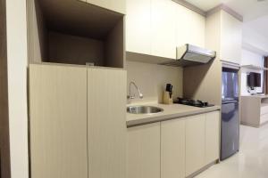Best Price Minimalist Studio Apartment at The H Residence By Travelio