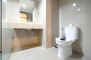 Best Price Minimalist Studio Apartment at The H Residence By Travelio