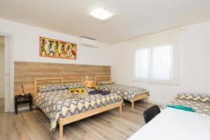 Chambre Quadruple avec Salle de Bains Privative