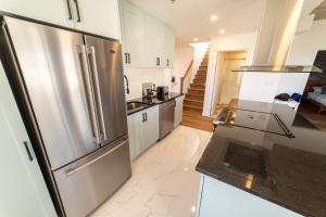 Aux Havres Urbains - Le Penthouse de la 3ième Avenue