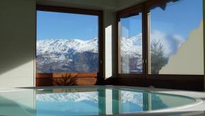 Villages vacances Arc en Ciel Les Karellis Vacances Bleues- Ski Pass Inclus : photos des chambres