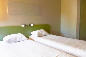 Hotels Hotel ibis Budget Laval : photos des chambres