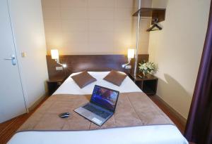 Hotels Hotel Inn Design Resto Novo Alencon : photos des chambres