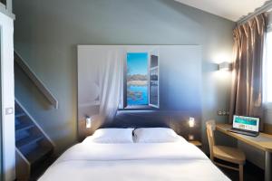 Hotels B&B HOTEL CHATEAUROUX Aeroport : Chambre Quadruple