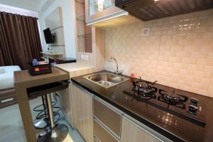 Studio Apartment Signature Park Grande near MT Haryono By Travelio
