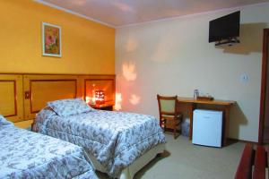 Pousada Vilage Inn Capivari Campos do Jordão