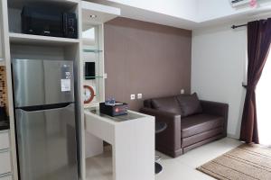 Homey 1BR at The Wave near Epicentrum Kuningan By Travelio