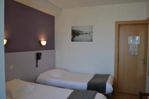 Hotels Hotel La Porte Saint Pierre-Logis Hotel Intra Muros : photos des chambres
