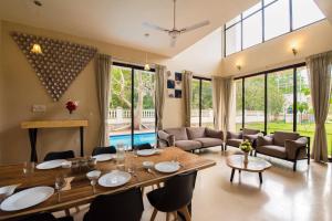 StayVista's Greenwoods Villa 10 - City-Center Villa with Private Pool, Terrace, Lift & Carrom Board