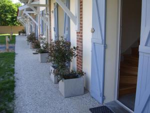 Appartements Domaine du Flamand - Gites du Flamand cote Piscine : photos des chambres