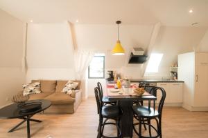 Appartements Le Nid Douillet, climatisation et parking prive : photos des chambres