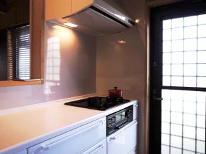 Amakusa Ebisu House -天草 えびすHOUSE , 港の前に建つ自然素材の一軒家-