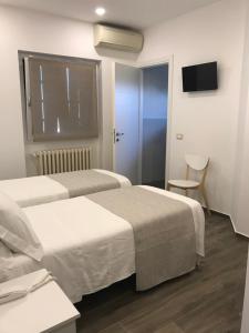 Camera Doppia con Letti Singoli