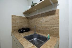 2BR with Sofa Bed The Springlake Summarecon Bekasi Apartment By Travelio