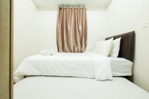 2BR with Sofa Bed The Springlake Summarecon Bekasi Apartment By Travelio
