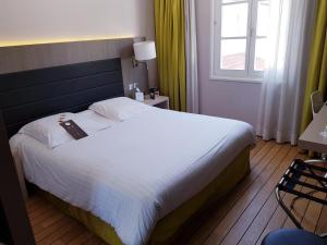 Hotels Logis Hotel Les Tuileries : photos des chambres