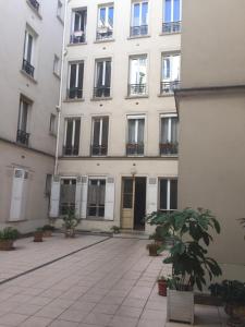 Appartements cosy rare 2 bedroom apartment around a private garden : photos des chambres