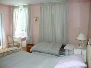 B&B / Chambres d'hotes AU CHARME DES POMMIERS : photos des chambres