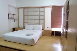 Classic and Strategic 3BR Apartment Sudirman Tower Condominium By Travelio