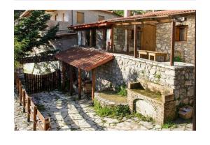 Stone house on the rock Parnassos Greece