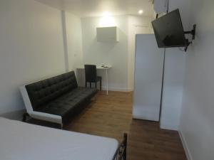 Appartements et studios meubles au centre ville d'Ouzouer Sur Loire : photos des chambres