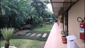 Flat Amarilis Riviera de São Lourenço Apartamento Duplex inteiro, 3 piscinas climatizadas, carregador veiculo elétrico, cozinha equipada completa, serviço de praia final semana, limpeza e enxoval completo com trocas diárias de toalhas