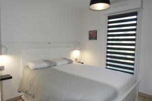 Appartements L'Oceanide - Appartement avec balcon-terrasse et parking prive : photos des chambres