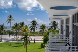 SUPERIOR Two Queens Partial Ocean View   room in Strand on Ocean by SS Vacation Rentals- Adult Exclusive