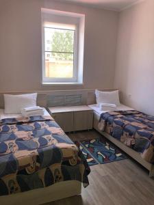 Economy Twin Room with Sofa room in Hotel Olimpiya
