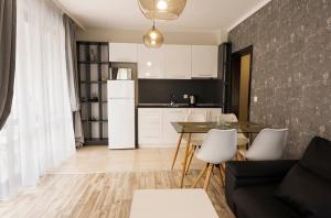 One-Bedroom Apartment with Balcony and Sea View room in Green Paradise Deluxe Apartments