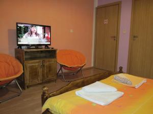 Double Room with Balcony (2 Adults + 1 Child) room in Pri Orehite Guesthouse