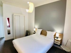 Hotels Cit'Hotel Le Volney : photos des chambres