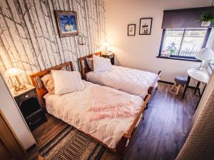 Maisons de vacances Holiday Home in Saint-Quirin Vosges Mountains : photos des chambres
