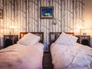 Maisons de vacances Holiday Home in Saint-Quirin Vosges Mountains : photos des chambres