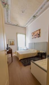 Triple Room with Shared Bathroom room in Vip Bergamo Rooms