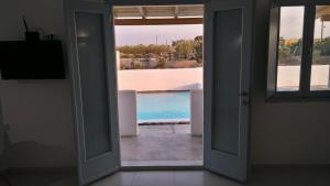 Double or Twin Room with Sofa Bed and Pool View