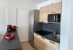 Appartements Boost Your Immo Chalet des Rennes 55 Prestige : photos des chambres