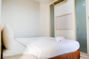 Comfy 1BR Twin Tower Apartment By Travelio