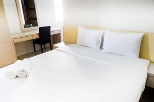 Comfy 1BR Twin Tower Apartment By Travelio