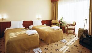 Twin Economy Room with Free Wellness Access room in Caro Hotel
